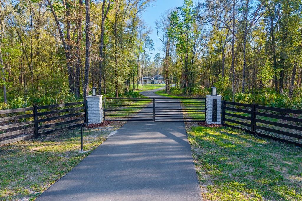 Photo of 3821 NE County Road 138, High Springs, FL 32643 (MLS # GC538738)