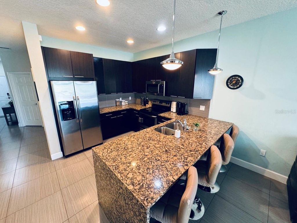 Photo of 17531 Placidity Avenue, Clermont, FL 34714 (MLS # O6329269)