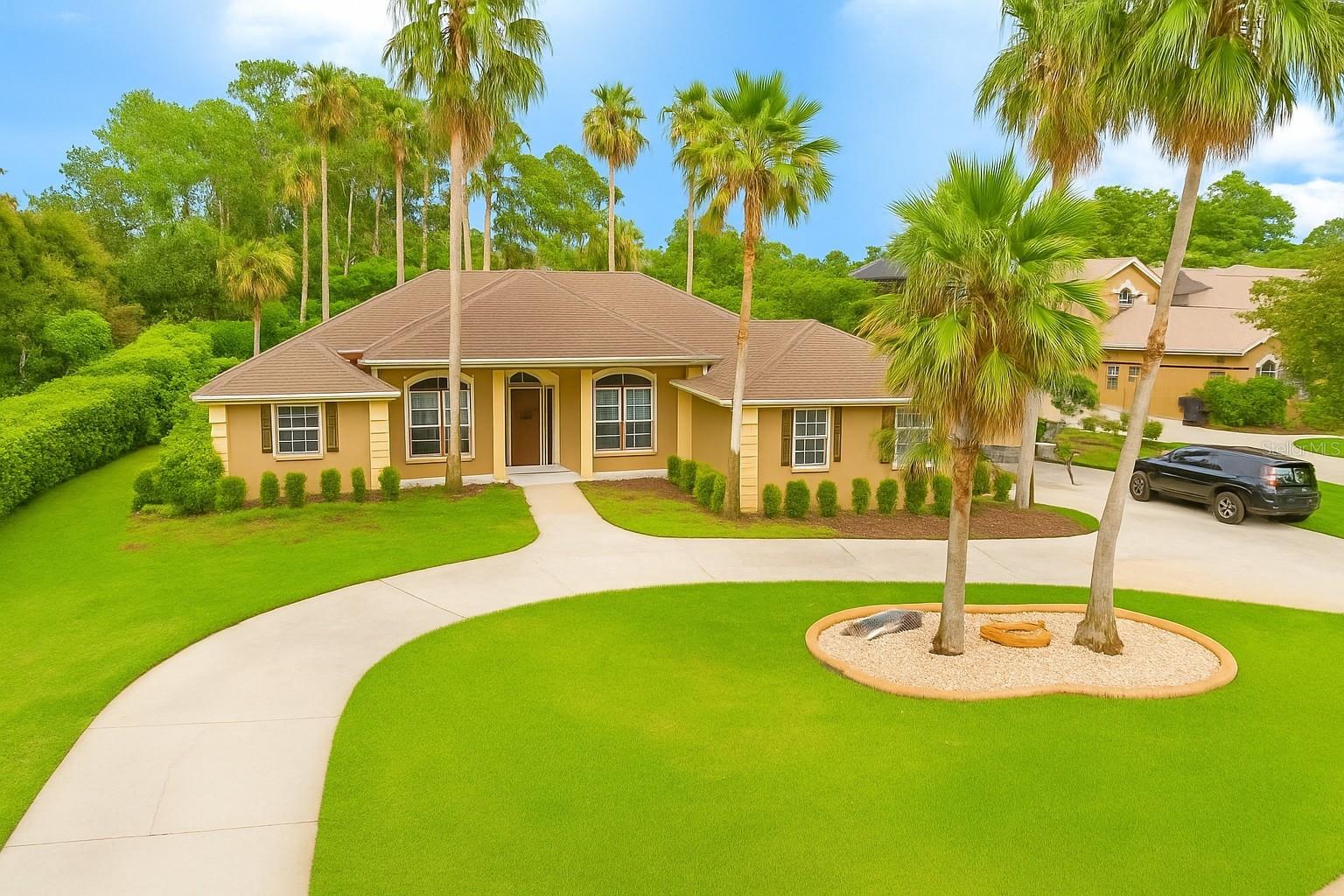 Welcome to the Estate Section of Glen Abbey Golf & Country Club!
Move-in ready and meticulously maintained, this 4-bedroom, 3-bath pool home offers the perfect blend of elegance, functionality, and Florida lifestyle. The spacious three-way split floor plan features high ceilings, formal living and dining rooms, and stunning hardwood flooring throughout.
The oversized primary suite includes a sitting area, pool access, and tranquil views of the lake and Glen Abbey’s signature golf hole. Enjoy outdoor living at its finest with a screened-in pool and spa, complete with rock waterfall and a large backyard ideal for relaxing or entertaining.
Features include: 4 Bedrooms | 3 Full Bathrooms, Three-way split plan, High ceilings & hardwood floors, Formal living and dining rooms, Nearly new stainless steel appliances, Newer A/C unit, Faux fireplace with built-in bookcases, Oversized homesite (~½ acre), Circular driveway & side-entry garage, Pool bath, Screened pool & spa with rock waterfall, Lake and golf course views.
Located in a top school zone with easy access to shopping, dining, I-4, beaches, and less than an hour to Orlando International Airport and attractions. This home truly has it all—schedule your showing today!