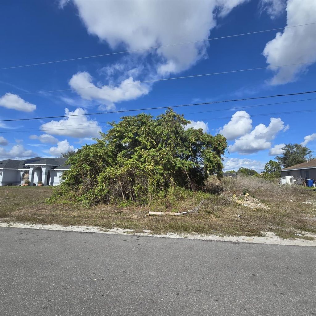 Photo of 2804 E 11th Street, Lehigh Acres, FL 33972 (MLS # O6381945)