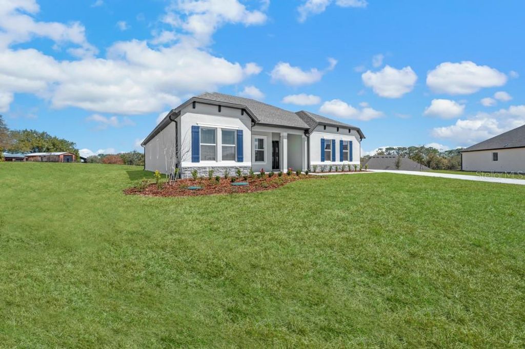 Photo of 36798 Sundowner Trail, Fruitland Park, FL 34731 (MLS # TB8486548)