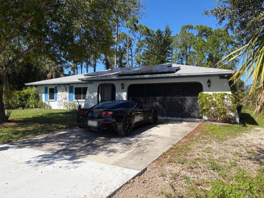 Photo of 18218 Driggers Avenue, Port Charlotte, FL 33948 (MLS # A4710914)