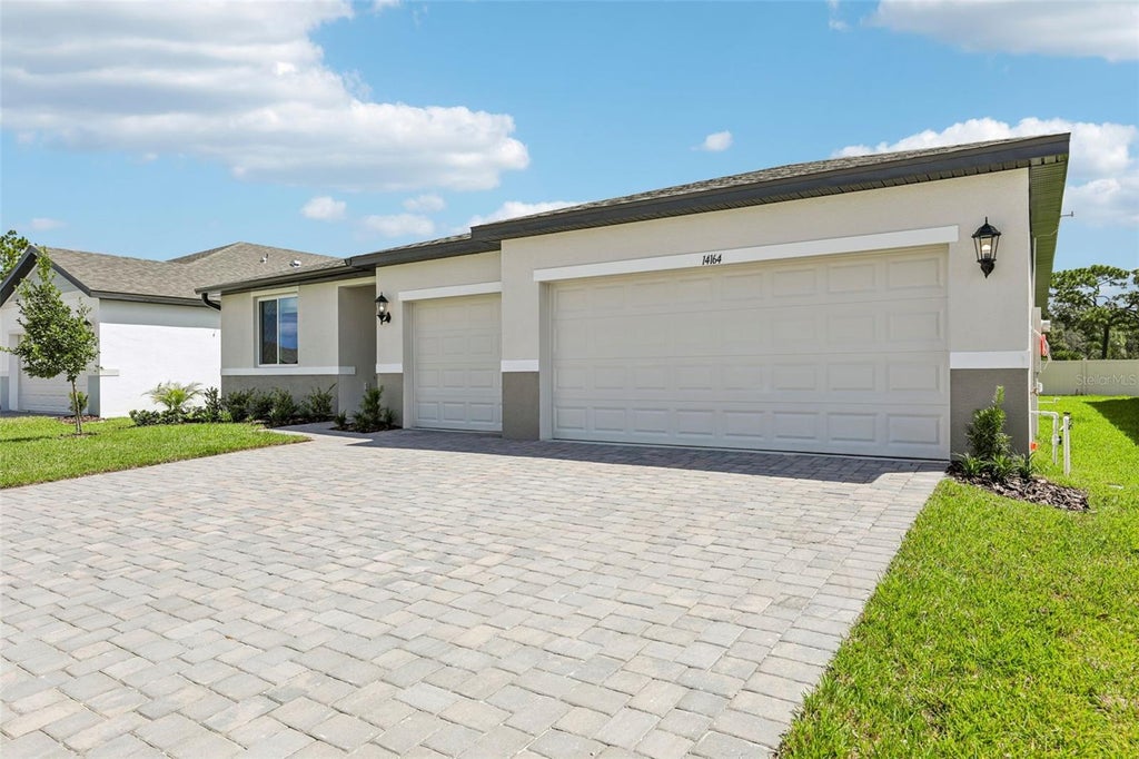 Photo of 14164 Harvest Pines Lane, Hudson, FL 34669 (MLS # TB8528595)