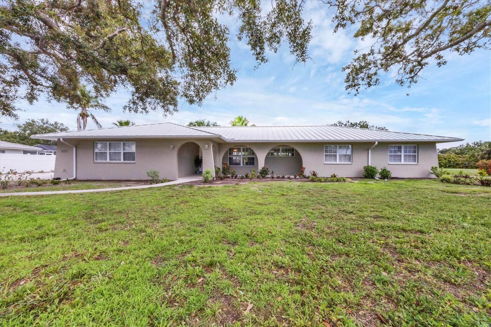 Nestled in the heart of Nokomis, this quaint 3 bedroom, 3 bath home offers a rare opportunity to own property in this sought after neighborhood located within walking distance to Nokomis beach. Situated on Bay Shore Road, this home boasts beautiful mature shade trees in the front and back, expansive back yard where you can sit and enjoy beautiful sunsets inside your screened in lanai.
This home has been meticulously maintained, it boasts a newer metal roof, with solar panels, plus two Tesla batteries in the 3-car garage.
Located minutes away from upscale restaurants, shopping and beaches, do not pass on this opportunity to own this gem of a house.