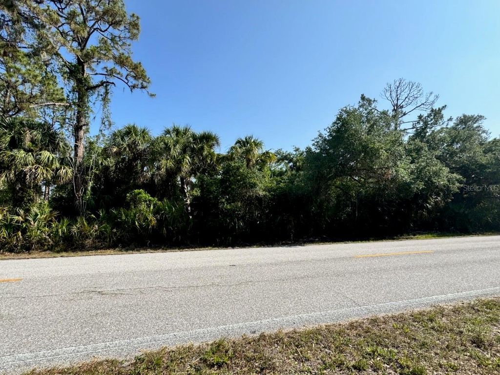 Photo of 14258 Chamberlain Blvd, Port Charlotte, FL 33953 (MLS # C7509323)