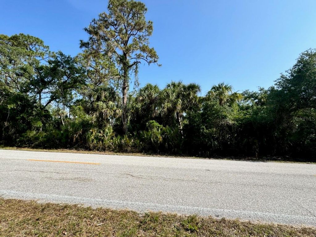 Photo of 14258 Chamberlain Blvd, Port Charlotte, FL 33953 (MLS # C7509323)