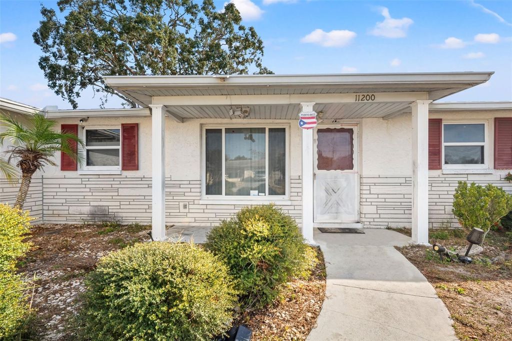 Photo of 11200 Tamarix Avenue, Port Richey, FL 34668 (MLS # TB8463069)