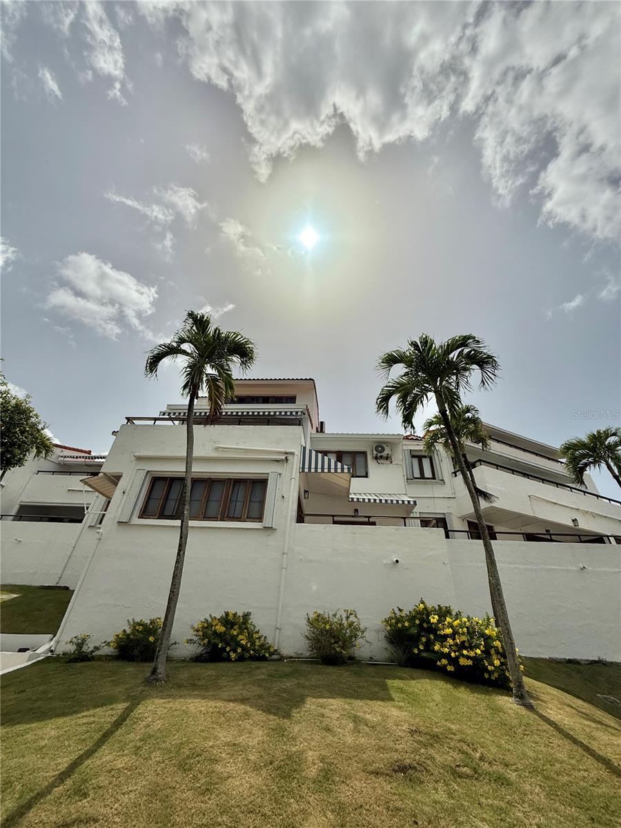 This is great Classic Mediterranean villa, within the premises of the Wyndham Grand Rio Mar Rainforest Beach and Golf Resort, your home away from home or your primary home. Resort lifestyle is unique. Is like being, feeling on vacation all the time. Villas Cluster 2 is a unique Golf course front property. Security is a plus as a gated community. Guard house also at the entrance to Cluster 2 Great restaurants within the premises, at the Wyndham Rio Mar Rainforest Beach and Golf Resort. Resort lifestyle. Two great championship golf courses and 13 tennis courts, great Beach Club, to enjoy as a club member (by membership), or resident. Very spacious, with unique views. The unit has 1 bedroom and 1 bathroom, spacious closet space and a laundry room. The villa has easy access to the pool and the lovely beach. Rio Mar also provides a lively beach club for owners and residents with a big pool and jacuzzi. Steps to one of the cleanest and most uncrowded beaches on the North Shore. Convenient parking space for cars and golf carts. The Club Membership at Wyndham gives great amenities including food and beverages discounts and access to hotel pools. Great Dining options abound. The resort offers a variety of restaurants. Further afield there are more restaurants on Highway 3 and in Palmer, with food kiosks at Luquillo – horse back riding in less 5 minutes at Carabali. The major outlet shopping mall, "The Outlet 66 Mall' at Canovanas, PR in less 10-15 minutes driving.