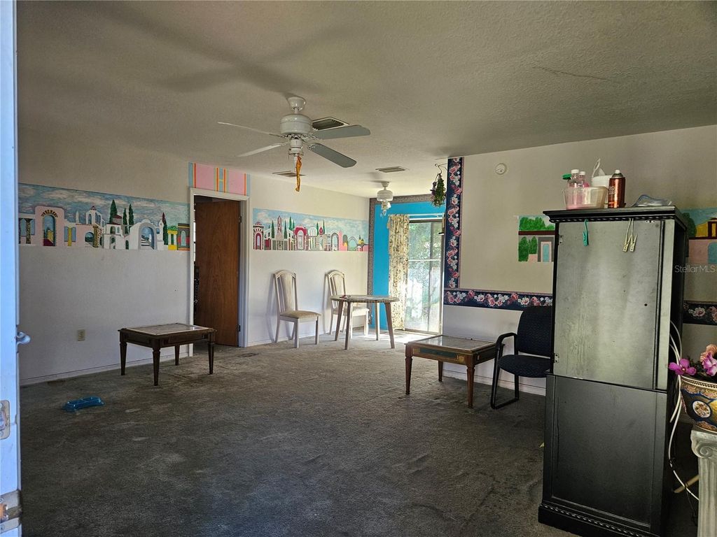 Photo of 113 Teak Loop, Ocala, FL 34472 (MLS # OM712717)