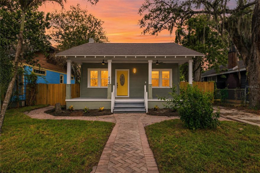 One or more photo(s) has been virtually staged. Welcome to 604 E Lambright Street, a beautifully restored 1920s bungalow with a 1/1 in-law suite located just blocks from some of Seminole Heights’ most popular hotspots like Heights Drive Thru, Rooster & the Till, Spaddy's Coffee and more! Full of charm, natural light, and endless opportunity, this unique property offers not only a renovated main home, but also an adorable detached in-law suite that opens the door to multiple possibilities. The main residence features 2 bedrooms and 2 bathrooms and has been thoughtfully brought back to life while maintaining the warmth and character that make historic homes in Seminole Heights so desirable. Inside, you’ll find bright neutral tones, large windows that flood the home with natural light, and durable brand new luxury vinyl flooring flowing throughout the entire space for a clean, cohesive, and modern feel. The inviting layout feels airy and welcoming from the moment you walk in. Some of the many new features include a new kitchen, new roof, new sod, fresh paint, and much more! One of the standout features of this property is the oversized front porch, creating the perfect place to enjoy your morning coffee, unwind in the evenings, or entertain guests while soaking in the charm of the neighborhood. Tucked behind the main home is the charming detached in-law suite complete with its own bedroom, kitchen, bathroom, and matching vinyl flooring throughout. Whether you’re looking for multigenerational living, or a private guest retreat, this setup offers incredible flexibility and investment potential.
The fully fenced yard provides privacy and functionality with new sod, a storage shed, multiple decks, and a gazebo. Making the outdoor space feel like your own private retreat in the heart of the city. With its unbeatable location near Seminole Heights favorites and its multiple buildings, 604 E Lambright Street is the perfect blend of historic charm, modern updates, and smart investment opportunity. You can even buy this house with the furniture for an additional price, so you can just move right in! Ask agent for pricing if interested!