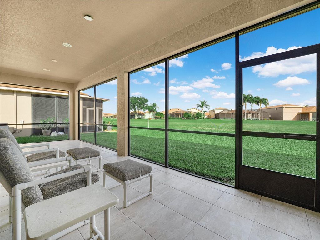 Photo of 5197 Pebble Beach Boulevard, Winter Haven, FL 33884 (MLS # P4937220)