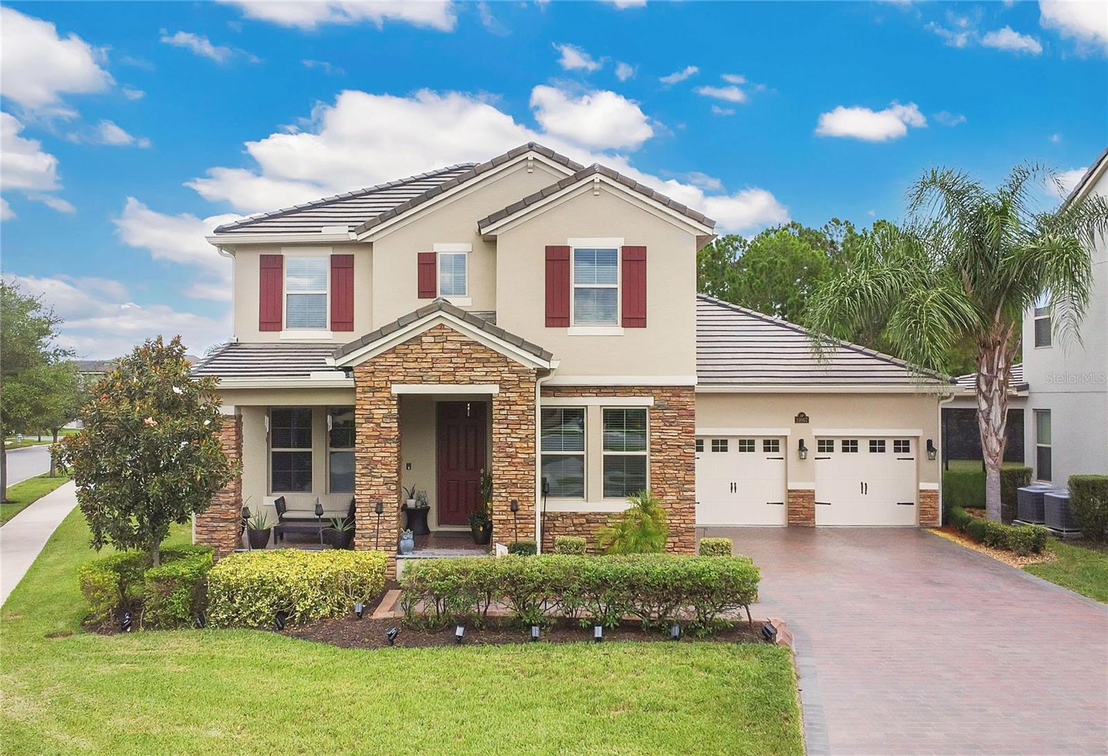 Stunning Emerald serie house, Selden model built in 2018 well maintained, featuring 4 bedrooms, 3.5 bathrooms, and approximately 2,920 sq ft of living space. Situated on a premium corner lot of about 10,585 sq ft, this home offers a 3-car tandem garage, spacious backyard, private wooded views, and a screen-enclosed private pool—perfect for year-round Florida living.
The open-concept design includes a formal dining room, elegant foyer with wrought-iron staircase, and a gourmet kitchen with a large island, 42” cabinets with crown molding, granite countertops, stainless steel appliances, and a convenient drop zone from the garage.
The owner’s suite boasts a tray ceiling, a spa-like en-suite bathroom with dual sinks, a garden tub, and a spacious walk-in closet. Additional features include a durable concrete tile roof, dual A/C units, and numerous upgrades: exterior lighting, sealed paver driveway and porch, landscape lighting, decorative stonework, epoxy-finished garage floor, and professional landscaping. Lawn care is included with HOA fee.
Located in the highly sought-after Waterleigh community in Winter Garden, residents enjoy resort-style amenities: two community clubhouses, 4 resort-style pools, 2 fitness center, beach volleyball, 2 tennis courts, mini-golf, community garden, dog park, fishing pier, and scenic walking/biking trails. The neighborhood is beautifully landscaped with lakes, green spaces, and planned community events.
Conveniently located just minutes from Historic Downtown Winter Garden, Winter Garden Village, and easy access to SR-429 for a quick commute to Orlando and Walt Disney World. Zoned for top-rated schools: Atwater bay Elementary, Water Spring Middle, and Horizon High School.