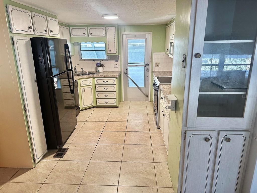 Photo of 2000 E Bay Drive #103, Largo, FL 33771 (MLS # TB8446486)