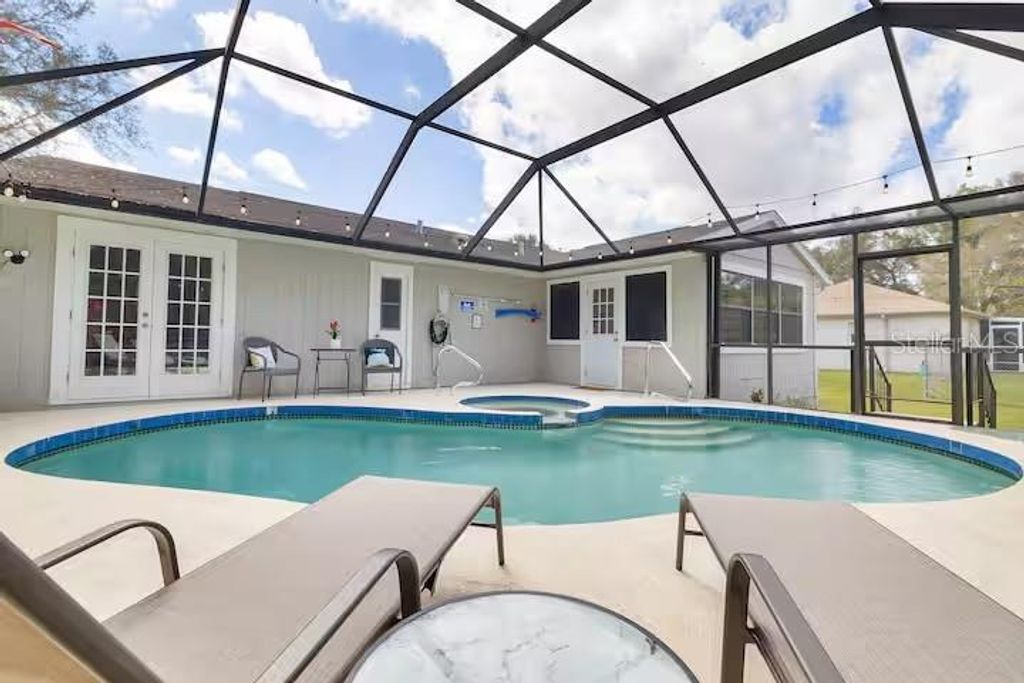 Photo of 3173 S Cranberry Boulevard, North Port, FL 34286 (MLS # C7515568)