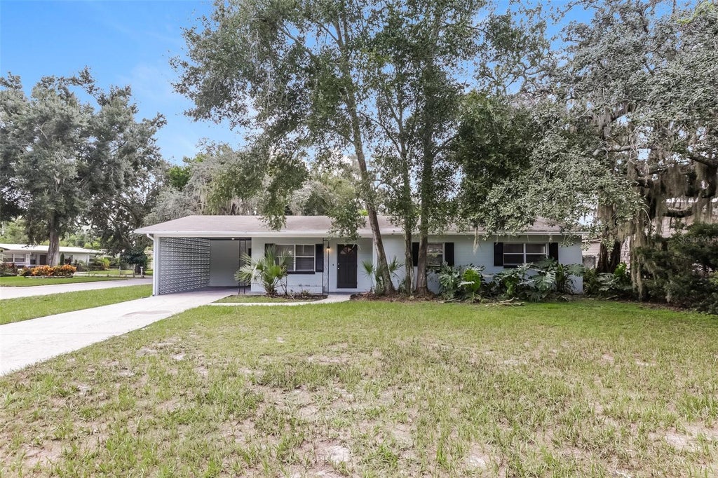 Photo of 7602 Pine Hill Drive, Tampa, FL 33617 (MLS # TB8551337)
