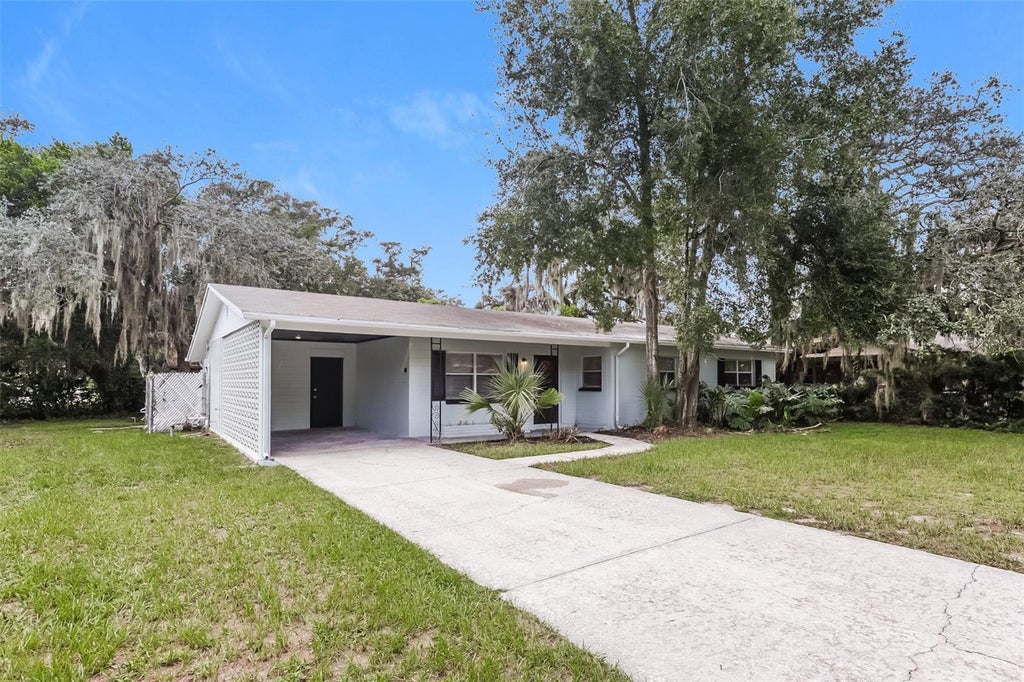 Photo of 7602 Pine Hill Drive, Tampa, FL 33617 (MLS # TB8551337)