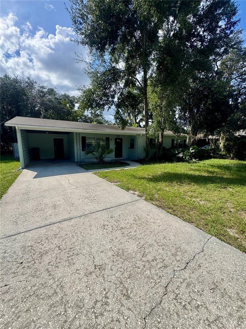 Photo of 7602 Pine Hill Drive, Tampa, FL 33617 (MLS # TB8551337)