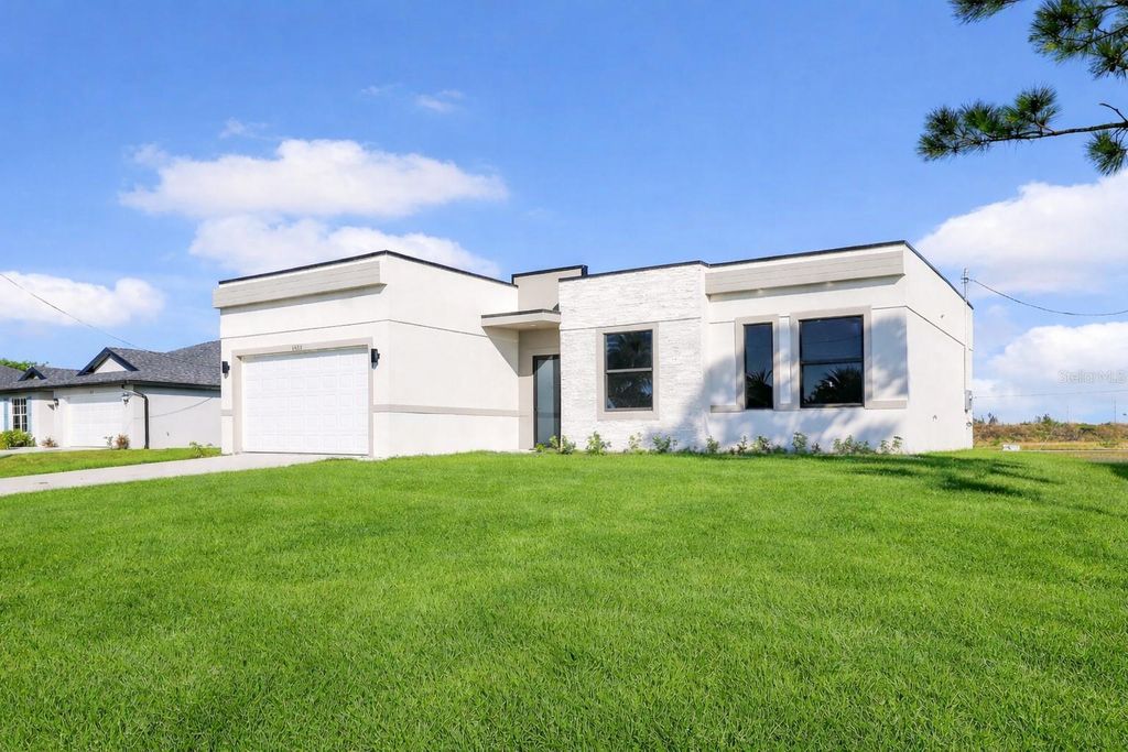 Photo of 1423 NW 20th Terrace, Cape Coral, FL 33993 (MLS # A4675123)