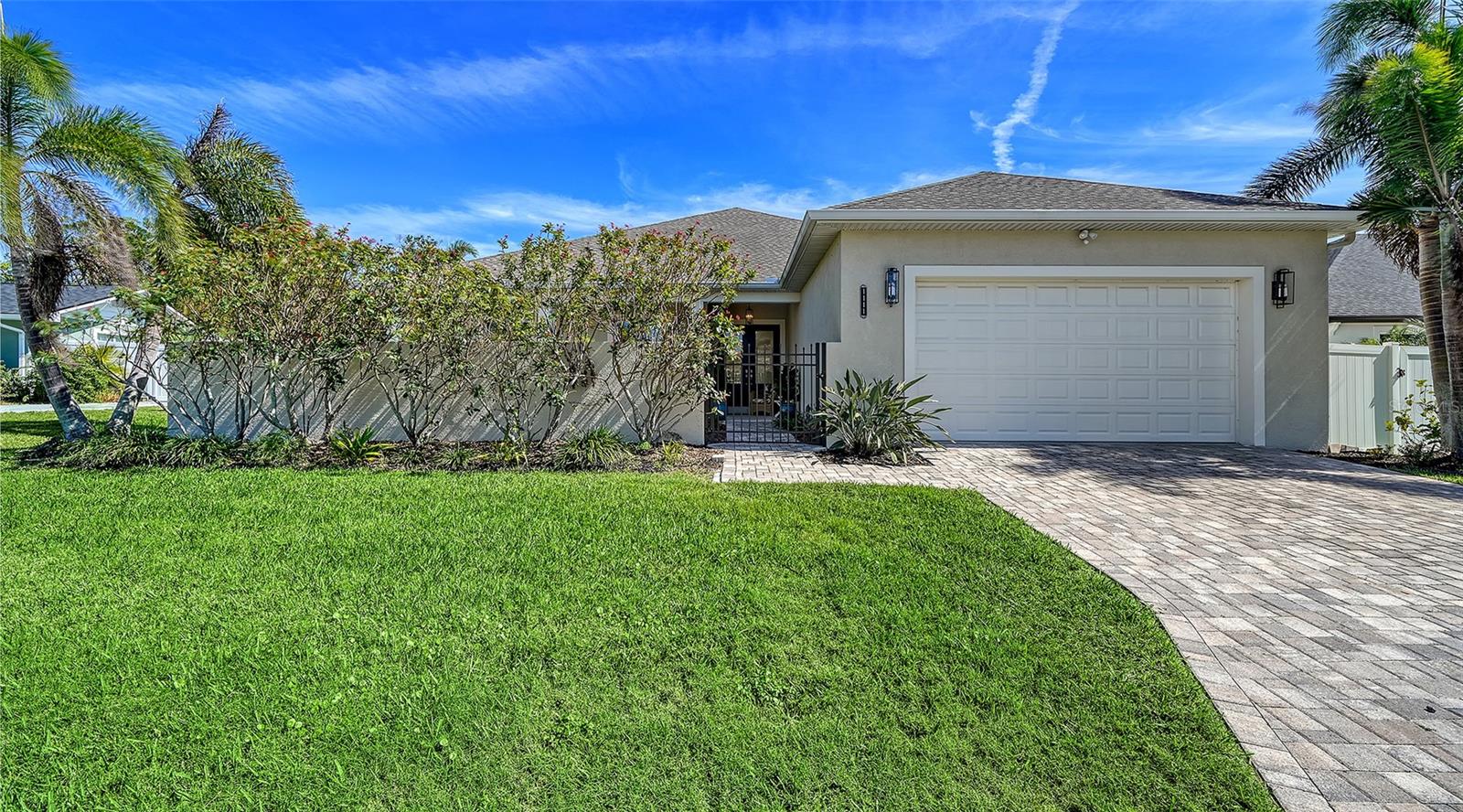 Please contact property manager Alexander Klotz (813) 430-0563 for ALL inquiries and showings. Listing agent does not have additional information.
Approx. 10 Minutes to IMG, privacy is yours in this beautiful 2017 built coastal contemporary single story home located in desirable Palma Sola Park two blocks from Palma Sola Bay. Custom built, this elegant, open concept home offers three bedrooms plus a den, three bathrooms and a spacious two car garage on an oversized quarter of an acre lot. Privacy abounds when entering this lovely home through the charming, large courtyard enclosed by a 4 foot high wall. Upon entering the double front entry doors, you'll be delighted with the open concept 11 foot high vaulted tray ceiling with crown molding in the Great Room and the sparkling chandeliers in both living & dining areas. Stunning, polished glossy concrete flooring runs throughout the whole house. All exterior & interior doors are 8 feet high. The sleek, modern kitchen features tall Shaker cabinetry & pantry, Cambria Quartz counter tops, stainless steel French door & lower freezer Kitchen Aid refrigerator, induction cooktop, double built-in Bosch ovens, dishwasher, custom lighting pendants plus a separate wine fridge & coffee bar. Three sets of tall French double doors in the living room open up to the spacious back lanai porch (12 feet wide by 40 feet long). Perfect for dining outdoors or entertaining guests, the motorized screen enclosure when down guarantees a bug free area or when up allows totally open views & access to the manicured, lovely fenced in backyard. The elegant primary suite features a 10'8" high tray ceiling, two walk-in closets, en suite rain shower head & soaking tub in the shower, double sinks with mini chandeliers and a separate toilet & bidet. A set of double French doors provide access to the screened porch. Two guest bedrooms also have 10 foot high ceilings as does the den. There is a separate laundry room with full size washer, dryer & sink leading to the spacious front facing two car garage. Contemporary design elements plus old world charm result in a blend of sophistication & style in this unique home. Home to many manatees, the boat basin close by connects to Palma Sola Bay, the IntraCoastal Waterway & the Gulf of Mexico. The Palma Sola neighborhood also has Portosueno Park & Rose Park, two small waterfront Manatee County parks. Nearby Palma Sola Causeway features a dog friendly beach & occasional horse back riding in the Bay opportunities. This custom home is located in desirable NW Bradenton's Palma Sola Park, minutes away from world renown Anna Maria Island, Gulf of Mexico beaches, Robinson Preserve (682 acres of trails), famous IMG Athletic Academy, golf courses, tennis & pickleball parks. A short ride brings you to Longboat Key, St. Armand's shops & restaurants as well as Sarasota's renown cultural activities. Airports serving this area are Sarasota Bradenton SRQ International, a half hour away, and Tampa International, an hour away.
Renter responsible for all utilities, landscape and pool service