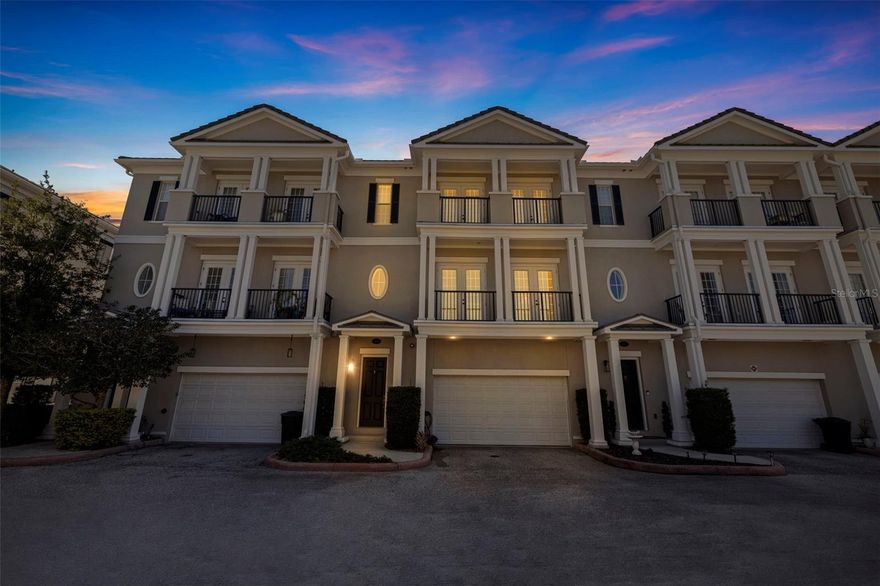 Luxury Townhome for Sale in Carillon | Back Bay at Carillon | St. Petersburg, FL. Experience elevated living in Back Bay at Carillon, a premier luxury townhome community located in the highly sought-after Gateway Corridor of St. Petersburg, Ideally positioned near I-275, Downtown St. Pete, Tampa International Airport (TPA), St. Pete-Clearwater International Airport (PIE), and the award-winning Gulf Beaches, this location offers unmatched convenience for commuters, executives, and relocation buyers. Nestled within Carillon Point, residents enjoy miles of scenic walking trails, lakeside boardwalks, Escallion City Center with premier shopping and dining or enjoy a round of golf or tennis at the Feather Sound County Club. This stunning townhome offers almost 4,000 square feet of luxury living space across three levels, designed for modern elegance and functional comfort. Luxury Features Include: Private elevator with access from garage to all three floors, Dramatic 20-foot ceilings in main living area, 10-foot ceilings on the 2nd  and 3rd floors, 5-inch crown molding, Open-concept floor plan, Solid wood cabinetry, Granite countertops,  Butler’s pantry, Wet bar and flexible family retreat space, Multiple balconies with front and rear views, Private patio overlooking the lake and Upper-level laundry room. The expansive primary suite features private balcony access, generous proportions, and a layout designed for privacy and relaxation. Two additional junior suites provide ideal accommodations for guests, multigenerational living, or work-from-home flexibility. Back Bay at Carillon residents enjoy resort-style amenities including: Community pool, Coastal modern clubhouse, State-of-the-art fitness center, Beautifully maintained landscaping and a Maintenance-friendly lifestyle. If you are searching for a luxury townhome in St. Petersburg, a Carillon home for sale, or a low-maintenance executive residence near Tampa and the beaches, this property delivers exceptional value without compromising luxury. Schedule your private tour today and discover why Back Bay at Carillon is anything but ordinary.
