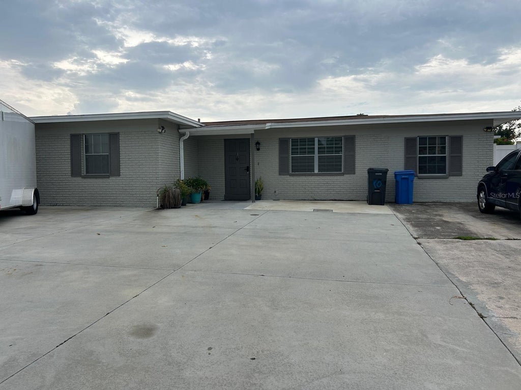 Photo of 6503 Dovewood Place, Tampa, FL 33634 (MLS # TB8534860)
