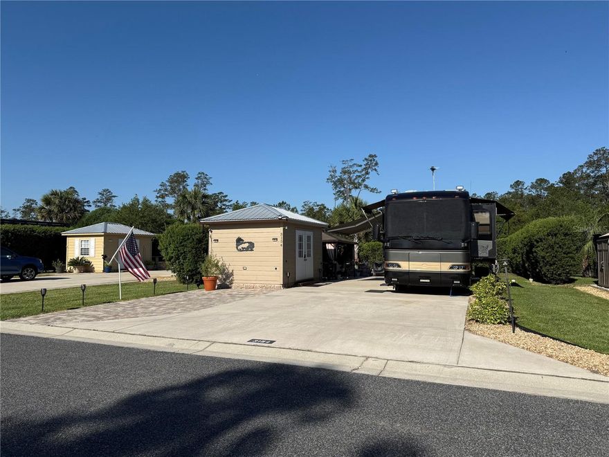 Discover your own private paradise in the heart of Central Florida at Wilderness RV Resort At Silver Springs! This deeded RV lot is ready for your perfect setup and includes a half-finished shed that's already insulated with power and water stubbed out, just waiting for your finishing touches. A charming gazebo and beautiful paver area create the ideal space for relaxing or entertaining. Surrounding the lot are giant mature bottlebrush hedges on both sides and the back, offering privacy, natural beauty, and a habitat that attracts hummingbirds, butterflies, and friendly bees — your own serene sanctuary for wildlife lovers.
Just minutes away is Silver Springs State Park, where you can experience world-famous glass-bottom boat tours, kayaking the crystal-clear spring run, hiking scenic trails, and spotting manatees, alligators, and native birds in one of Florida’s oldest natural attractions. Love live entertainment, dining, and nightlife? Head to The Square in historic downtown Ocala, where you'll find a variety of local restaurants — from upscale spots and wine bars to farm-to-table favorites and cozy cafes.
Above the popular Brick City Southern Kitchen, there's a lively pool hall perfect for a night out with friends. Just steps away, enjoy retro vibes and classic cinema at the Marion Theatre, showcasing old-school films with a full liquor bar. Or grab a front-row seat at the Bonkerz Comedy Club, where laughter fills the room every weekend with nationally touring stand-up acts.
This lot isn’t just about where you park your RV — it’s a gateway to an active, adventure-filled lifestyle in one of the most charming and vibrant pockets of Florida. Whether you're seeking seasonal escape or a full-time base, this is where comfort, convenience, and community come together.