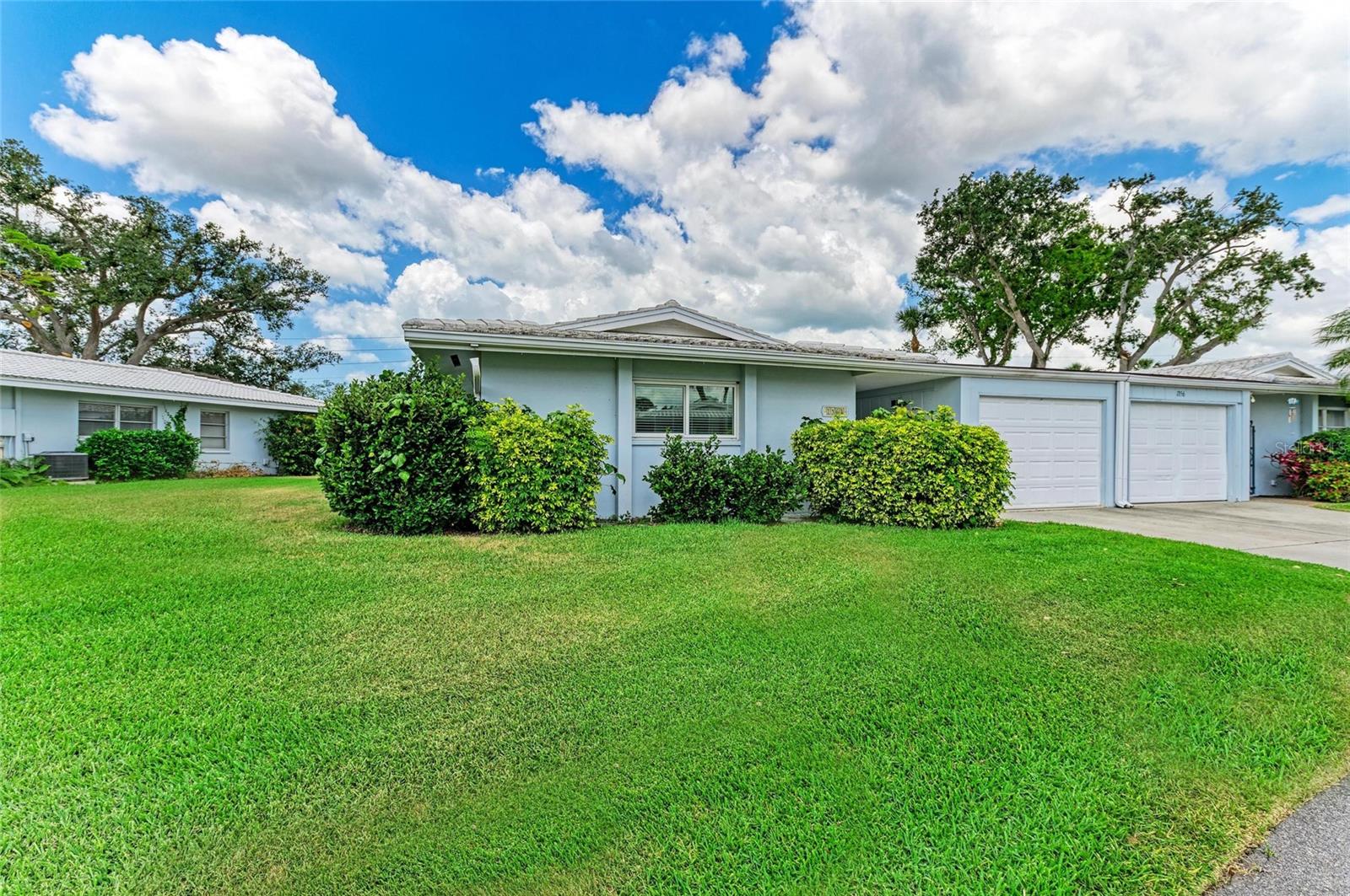 Back on the Market! If you are looking for a villa in a 55 plus community that is storm ready then this is the one for you! This villa has recently undergone a complete renovation and is move in ready. All the windows are impact windows and the 3 sliding patio doors have roll down hurricane shutters.! Ceramic plank tile floors throughout including the front entrance walk way. Beautiful shaker style kitchen cabinets with a 32 square foot ISLAND with granite countertops. The kitchen is expansive and open to the entire living area for great entertaining or enjoying the beautiful backyard with mature landscaping. This villa has an enclosed "Florida Room" as well as a tiled screen room for the perfect evening cook out. The laundry room is over 100 SF with plenty of storage and granite countertops. The primary bedroom has a walk in closet as well as a barn door that leads into the ensuite bathroom with a walk in shower and glass door. This villa will be getting a NEW ROOF August 22, 2025 by Southeast Roofing Consultants (under contract for $24,000, paid in full with a transferable warranty)!