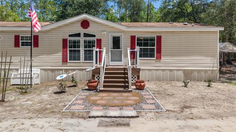 Photo of 106 Arrowhead Point Road, Hawthorne, FL 32640 (MLS # OM725764)