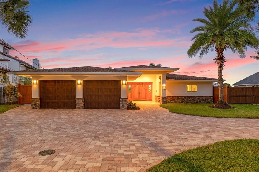 LOCATION! LOCATION! LOCATION!! This sprawling 1 story WATERFRONT ranch home is situated on over 90ft of waterfront on the beautiful wide waterway leading into Smacks Bayou which leads you right out to Tampa Bay. A meticulously maintained home with attention to every detail. Situated on an extra wide lot (93x131) offering room for RV or boat parking with 30 amp electrical service (upgradable to 50 amp service) and water tap, and plenty of room to add a pool. Sit on your private dock every morning and watch the sunrise and watch the sunset in the evenings. Keep your boat protected under the covered boat slip with 10,000 lb lift, which is grandfathered in and is a rare find.  
A spacious wide-open floor plan offers beautiful marble flooring throughout the home leading you through to the wide-open water views across the back of the home. The kitchen is an absolute chef’s dream offering an abundance of custom cabinetry made of 1/4 cut oak-topped with a unique leathered granite.
High-end appliances featuring a Miele built-in coffee maker, Meile steam oven, GE Profile Advantium microwave, Dacor range with convection oven, Dacor warming drawer, Fisher and Paykel drawer dishwasher, and a built-in Kitchen Aid refrigerator. A walk-in pantry is also a bonus. The breakfast island is granite and offers plenty of additional seating. The kitchen is open to the formal dining area and formal living area. There is a wood-burning fireplace which offers perfect ambiance for gatherings and holidays. The bonus room or recreation room is expansive (~700 sf), light and bright and offers the most spectacular water views. The primary bedroom is private and offers a water view, a spacious walk-in closet, and a full en-suite bath featuring a shower with glass enclosure, a custom double vanity with Onyx countertops. The guest bedroom has an en-suite bath with shower and whirlpool tub, and an oversized walk-in closet. There is a third bedroom that could also be used as a home office. The hall bath includes a shower and also features Onyx countertops.  Hurricane impact windows and sliding doors throughout.
This home features an amazing outdoor living/entertaining space. Sliding doors from the dining area open to a covered patio with a grilling area and fire pit. This would also be a perfect spot to add a pool. (There is already a pool bath just off the patio.) Brick pavers lead you to the dock with a covered boat slip and kayak rack where you can drop your boat, kayak, or paddleboard in and head right out into the bay. Other features of the home include an oversized 2-car garage, a circular brick paver drive (recently re-sealed)
and landscaping with an irrigation system connected to a public reclaimed water source. From here, you
are just minutes from downtown St Petersburg or downtown Tampa by boat. The Gulf beaches are just a 30-minute boat ride away. This Snell Island neighborhood is tucked away and is just steps away from the Vinoy Golf Course and Crisp Park. You are also just a bike ride or golf cart ride from Publix, Trader Joe’s, Fresh Market, and the new Whole Foods market opening very soon! Take the waterfront sidewalk to our vibrant downtown, where you will find waterfront parks, sidewalk cafes, cultural restaurants, museums, and more. Come live the waterfront lifestyle in the heart of everything there is to love about St Pete.