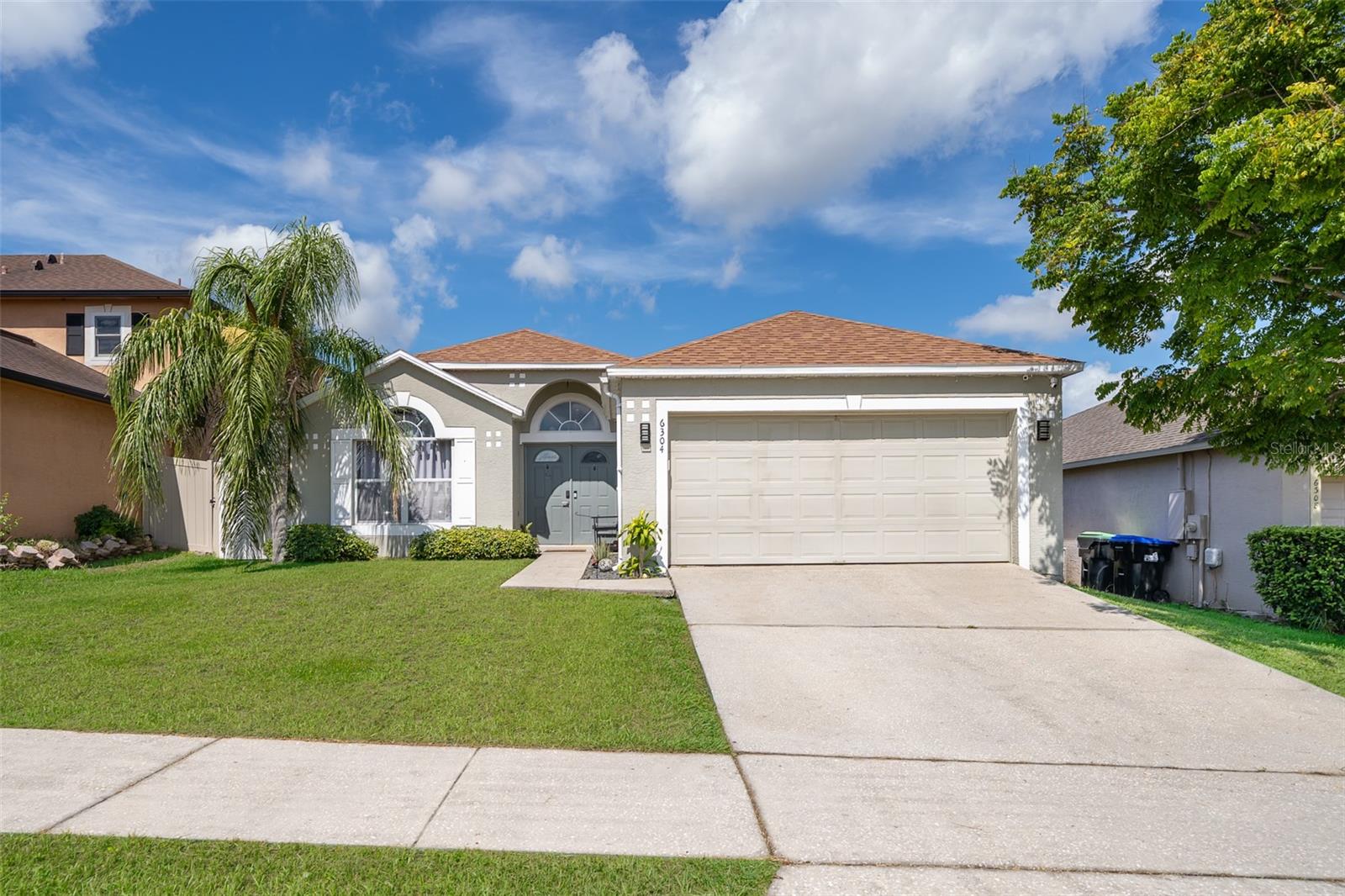 Fantastic opportunity for first-time homebuyers! This charming home, welcomes you with a beautiful double-door entry and a bright, open layout. The spacious kitchen features a breakfast bar, eat-in area, and closet pantry, making it perfect for everyday living and entertaining. Sliding glass doors lead to a fully fenced backyard complete with a wood deck and gazebo ideal for relaxing or hosting gatherings.The desirable split floor plan offers a private primary suite at the rear of the home, boasting a walk-in closet, dual sinks, soaking tub, and separate shower. Two additional bedrooms are located at the front, along with a full bathroom, creating the perfect setup for family or guests. Enjoy peace of mind with a 2017 roof, 2015 A/C. Conveniently located near Hiawassee Road and SR-414, with quick access to shopping, dining, and major highways. Sold as-is