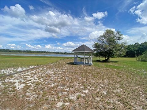 Photo of 148 Swan Lake Drive, Melrose, FL 32666 (MLS # GC534048)