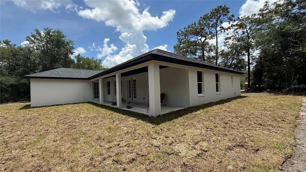 Photo of 35031 Primrose Lane, Webster, FL 33597 (MLS # TB8513962)