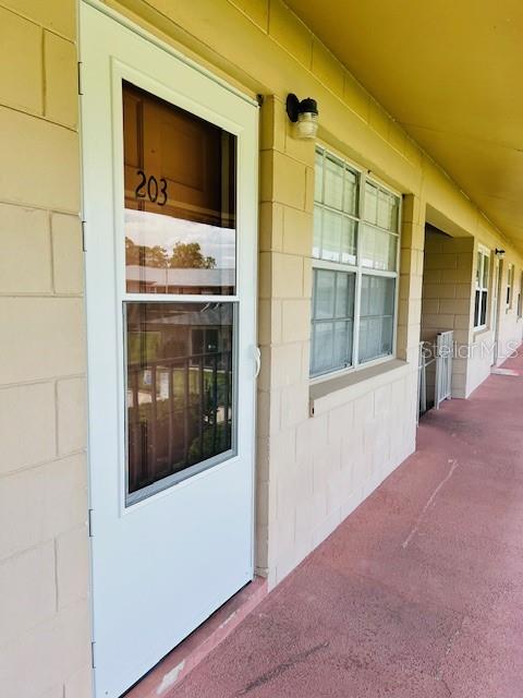 Don't miss a great opportunity to own this hidden gem! Located in downtown Tavares, just 3 miles from downtown Mount Dora. This one bedroom condo is spacious and ready for immediate occupancy! Easy to maintain with tiled floors and a great layout. The community is small and inviting with a beautifully landscaped courtyard, reserved owner parking, a sparkling swimming pool, and new laundry machines in the community laundry room. Located in the heart of downtown with so many eateries, churches, businesses, shopping and more. Tavares is only 30 miles to downtown Orlando for easy commuting. Whether you are ready to retire and live the ultimate Florida life or just starting out, this is a great opportunity. There are only 12 rentals allowed in the community and this unit CAN BE RENTED and is APPROVED as a 2025 RENTAL. Investors are welcomed! Newly constructed townhomes starting in the $300s are just across the street.