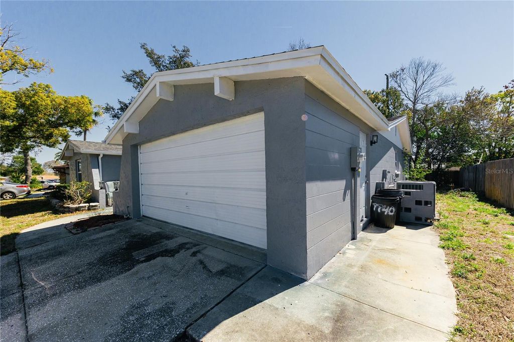Photo of 7740 Sagebrush Drive, Port Richey, FL 34668 (MLS # TB8475447)