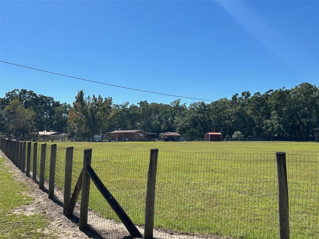 Photo of 698 NW 76th Terrace, Ocala, FL 34482 (MLS # OM712737)