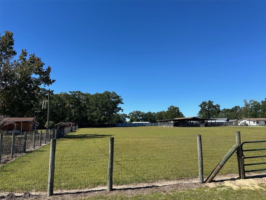 Photo of 698 NW 76th Terrace, Ocala, FL 34482 (MLS # OM712737)