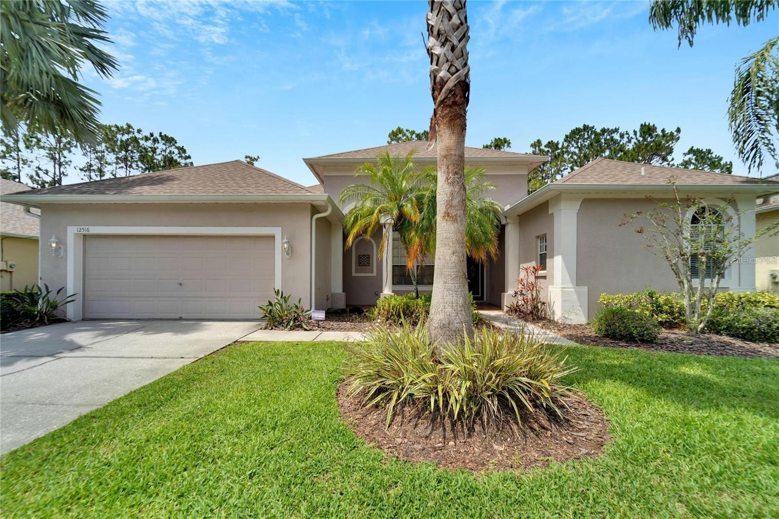 Welcome to this stunning 4-bedroom home located in the highly desirable Westwood Lakes community. This beautifully maintained residence features expansive stepped 16-foot ceilings in the formal living areas and a professionally landscaped yard that adds to its impressive curb appeal. Inside, you'll find a spacious kitchen equipped with appliances, elegant stone countertops, and ample storage and counter space. The kitchen opens seamlessly to the family room, offering lovely views of the backyard — perfect for both everyday living and entertaining. Throughout the home, you'll enjoy 10-foot ceilings and 8-foot interior doors, creating a grand and open feel. Thoughtful design elements such as rounded corner walls and arched transitions add to the home's charm and sophistication.
Westwood Lakes offers an excellent location and exceptional community amenities, including a scenic paved exercise trail, a park and playground, and access to top-rated A-rated schools. Don’t miss the opportunity to make this exceptional home yours!
