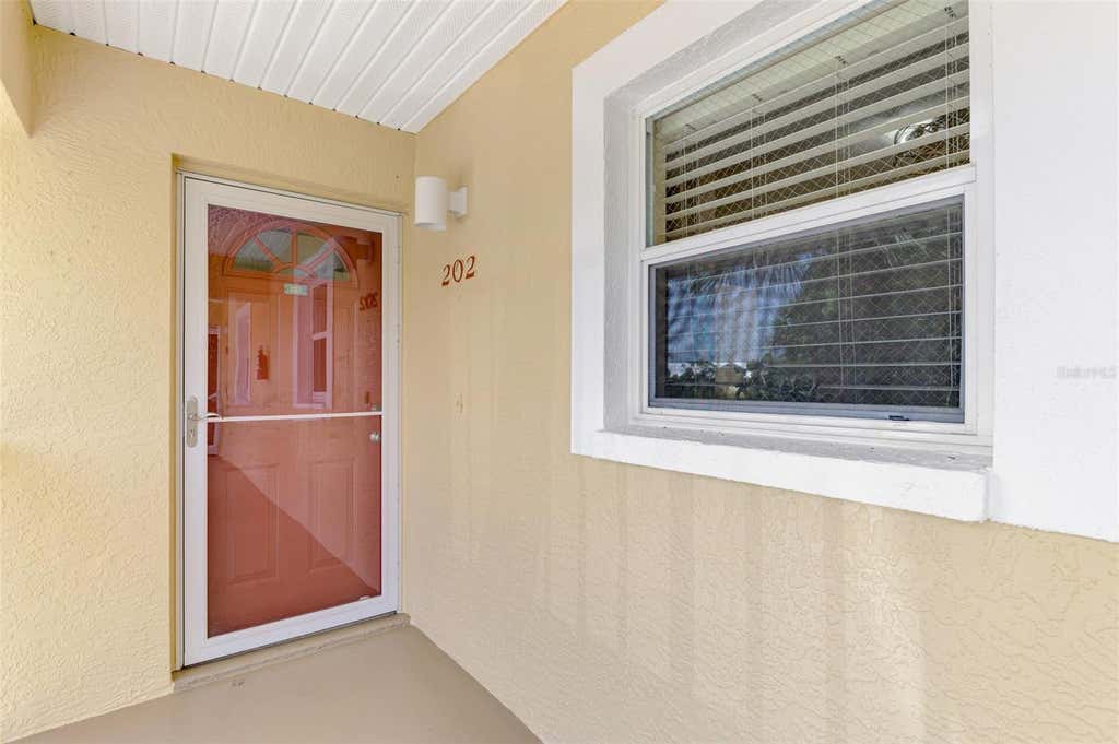 Photo of 6610 Gasparilla Pines Boulevard #202, Englewood, FL 34224 (MLS # D6148122)