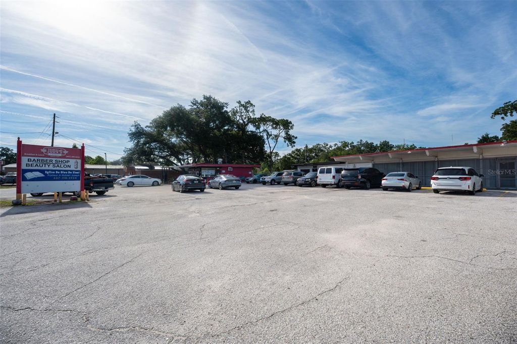 Photo of 5220 Old Winter Garden Road, Orlando, FL 32811 (MLS # O6424180)