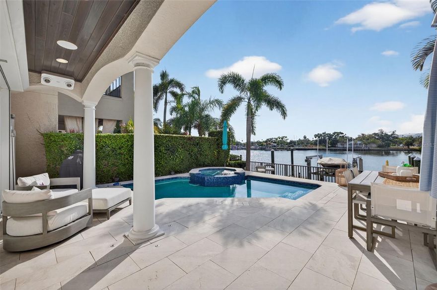 Discover the rare chance to own a luxury waterfront home within Harbour Island’s exclusive 24/7 guard-gated enclave. This fully transformed residence blends refined design with true resort-style living. Wide-plank hardwoods, polished marble, Restoration Hardware fixtures, artisan finishes, and a custom Sub-Zero bar elevate the interior ambiance. The Quartzolite kitchen with gas cooking and premium built-ins enhances both daily living and entertaining.
The home features a fully controlled smart-home system, allowing effortless management of lighting, climate, entertainment, and pool functions throughout the property. The primary suite lives like a private spa, offering heated marble floors, a ThermaSol steam shower, and an MTI hydrotherapy tub. Updated mechanical systems include dual A/C units installed in 2018, tankless water systems, an elevator, and a generator-ready electrical panel providing comfort, efficiency, and peace of mind. A new roof completed in 2024 further strengthens the home’s long-term integrity.
The outdoor living experience rivals a luxury resort: a vibrant pool and spa, resurfaced deck, updated lighting, surround sound, app-controlled systems, and deep-water canal frontage perfect for enjoying Tampa’s spectacular sunset views. Waterfront amenities include a 16,000-lb boat lift, mounted water-illuminating lighting, an artificial reef, and a refreshed dock.
A rare combination of elegance, privacy, security, modern technology, and sunset-facing waterfront living, just moments from Tampa’s top dining and entertainment destinations.