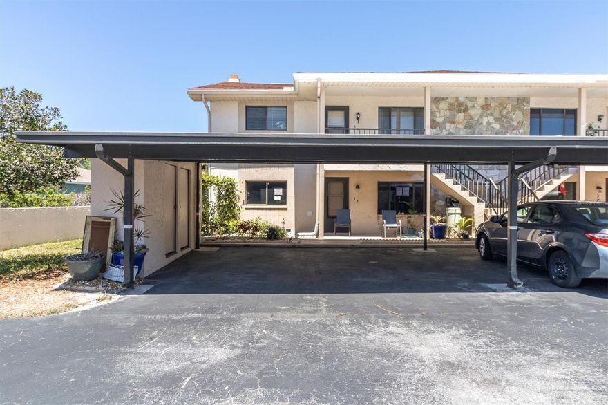 Discover the vibrant lifestyle awaiting you in the 55+ community of Eagles Point! This spacious and inviting two-bedroom, two-bathroom condo offers the perfect blend of comfort and convenience with Gulf access. Imagine cozy evenings by the stunning floor-to-ceiling stone fireplace in your open-concept living area. The well-appointed kitchen boasts ample counter space, abundant cabinetry, a large pantry, and a convenient breakfast bar/pass-through to the dining room – perfect for effortless entertaining. Retreat to the generously sized primary suite and guest bedroom, both easily accommodating king-size beds. Extend your living space year-round in the expansive enclosed lanai. Eagles Point offers fantastic amenities, including a heated pool, clubhouse, billiards, private fitness room, boat dock, and kayak storage. Enjoy worry-free living with an HOA that covers water, sewer, basic cable, trash, flood insurance, roof, and exterior maintenance. Investors take note: rental is permitted immediately after purchase! Whether you're ready to embrace Florida living now or in the future, this is an exceptional opportunity. Schedule your showing today!