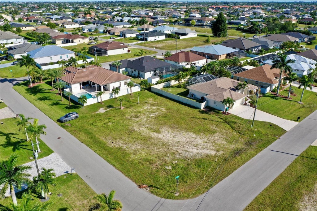 Photo of 309 NW 35th Place, Cape Coral, FL 33993 (MLS # C7531315)