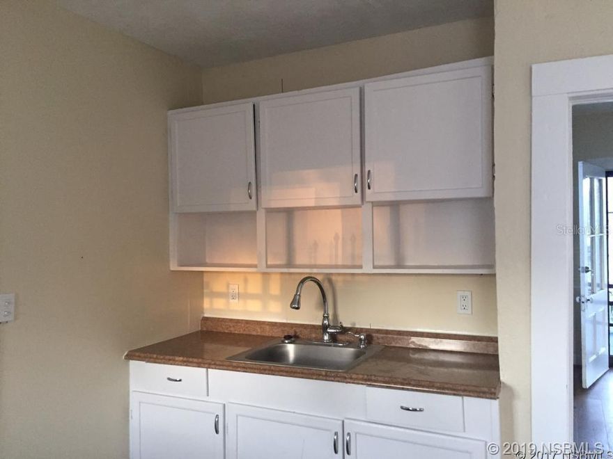 This home has been renovated and is separated into two rentals an upper and lower unit - 110 L and 110 U the lower unit is what is available and has a nice porch. It is one bedroom one bath full kitchen, on demand hot water heater, no laundry hook ups but laundry mat down the street, there are two window units for ac one in living room and one in bedroom, pet may be considered 6 month to one year minimum lease- not furnished Great location just steps away from Historic Canal Street and only a few miles from the beach