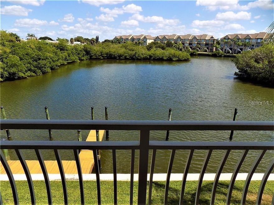 Waterfront living made effortless. This 2-bedroom, 2-bath condo at Bay Pointe puts wide-water and mangrove panoramas front and center. In just about 10 minutes you can be at the airport, two major malls, or on the highway; within 5 miles you’ll find a long list of restaurants, cafes, and shops.
Spend slow mornings and golden-hour evenings on an oversized, 200+ sq. ft. patio—keep an eye out for manatees and dolphins cruising by, and enjoy both sunrise and sunset color shows. If you’re a boater, you’ll love the direct path to the bay with no fixed bridges and the first-come, first-served community docks. There’s secure storage for kayaks and bikes.
Resort-style common areas round out the lifestyle: a saltwater pool set right on the water, a rec room beside the pool, a clubhouse, and courts for tennis, pickleball, and basketball. The monthly fee simplifies ownership by covering water, trash, grounds care, assigned parking, dock access, building maintenance, and flood insurance.
If you’ve been searching for an easy, coastal home base—whether for full-time living or a lock-and-leave escape—this is it. Schedule your private showing and come see the bayfront lifestyle up close.
