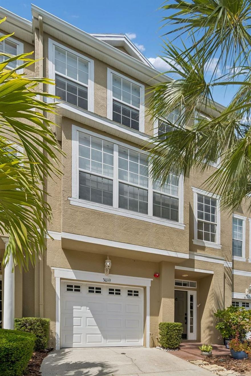 Welcome to Bayshore Pointe, a gated South Tampa community offering a lifestyle as inviting as the home itself. Residents enjoy a community pool, tennis and pickleball courts, lush green spaces with a scenic pond and fountain, access to a private pier just across from the entrance, and a relatively low HOA. This three-story townhome is one of the larger floor plans in the community, offering nearly 2,000 square feet of thoughtfully designed living space with 3 bedrooms, 2 full bathrooms, 2 half bathrooms, and a one-car garage. Meticulously maintained, the home blends functionality with comfort across all levels. The first floor features a versatile bonus room ideal as a family room, home office, or gym, along with a half bathroom, laundry, and access to a covered patio overlooking green space. The second floor is dedicated to the main living areas, where a spacious, light-filled living room flows into the dining area and a well-appointed kitchen complete with a gas range, center island, and bar seating. An additional half bathroom adds convenience on this level. Upstairs, the third floor serves as a private retreat with three bedrooms and two fully renovated bathrooms, finished top to bottom with modern updates. Ideally located near outdoor destinations like MacDill 48 Park and Gadsden Park, and just minutes from MacDill Air Force Base. Enjoy easy access to local favorites including Big Ray’s Fish Camp, Bocelli Modern Italian, SOG Cafe, and Mad Dogs & Englishmen. Zoned for highly rated Ballast Point Elementary and Robinson High School, home to an esteemed IB program. HVAC 2024. Gas water heater 2020. Roof 2015. NO storm damage. 
Schedule your private tour and make this move-in ready townhome yours today!