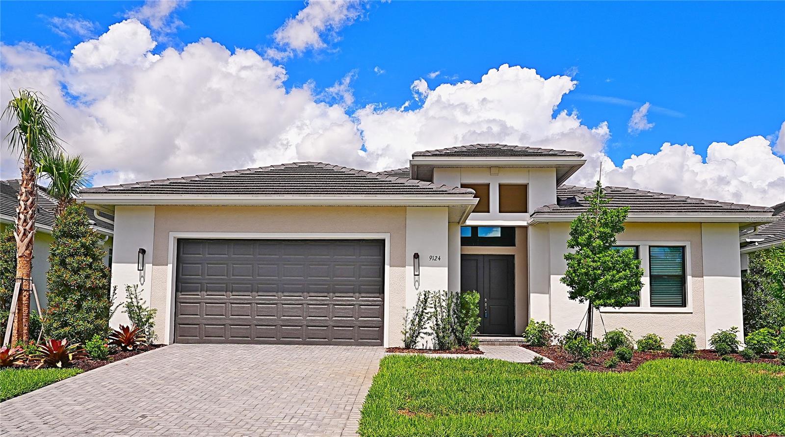 Annual Rental Available 7/20/25. Welcome to ARTISTRY! Your first impressions will be, “Wow”. This stunning Van Gogh model- 2023 poised to fulfill your vision of the ultimate Florida lifestyle. The meticulously designed 3 bed/3 bath/+ office house is a harmonious blend of spaciousness and functionality. As you step through the front door, you are greeted by a seamless flow of living spaces adorned with recent interior paint that brings a fresh and inviting ambiance to every room. Enjoy the Open Floor Plan with high 11'4" ceilings & great windows, sliding doors with absolutely amazing Lake View. The beautiful kitchen is the heart of the home complete with large Island, customized quartz counter tops & stainless steel appliances. The Master Suite is bright and spacious. The master bath features dual sinks, huge walk-in shower, large walk in closet. Two additional bedrooms, along with two additional well-appointed bathrooms, ensure that guests are accommodated with both style and convenience. Outside, the expansive screened lanai with a heated pool, spectacular Lake View beckons you to relax looking at unwind. Living in ARTISTRY means access to an array of exceptional amenities designed to enhance your quality of life. Indoor Amenities are Fitness Center, Yoga & Aerobics Studio, Community Room. Outdoor Amenities are Resort-style Pool & Sundeck, Sports Court, Social Patio & Lounge Area, Wide Walkways & Nature Trail, Playground. Located close to Siesta Key Beach and downtown Sarasota, you'll have easy access to shopping, dining, University Town Center, Waterside Place, top-rated medical facilities, golf courses, and more. Tenants shall pay all utilities. Pool/Lawn Maintenance are included to rent. No cats, a small dog is ok ($300 non-refundable pet fee), $49 application fee/adult. Call for a private showing.