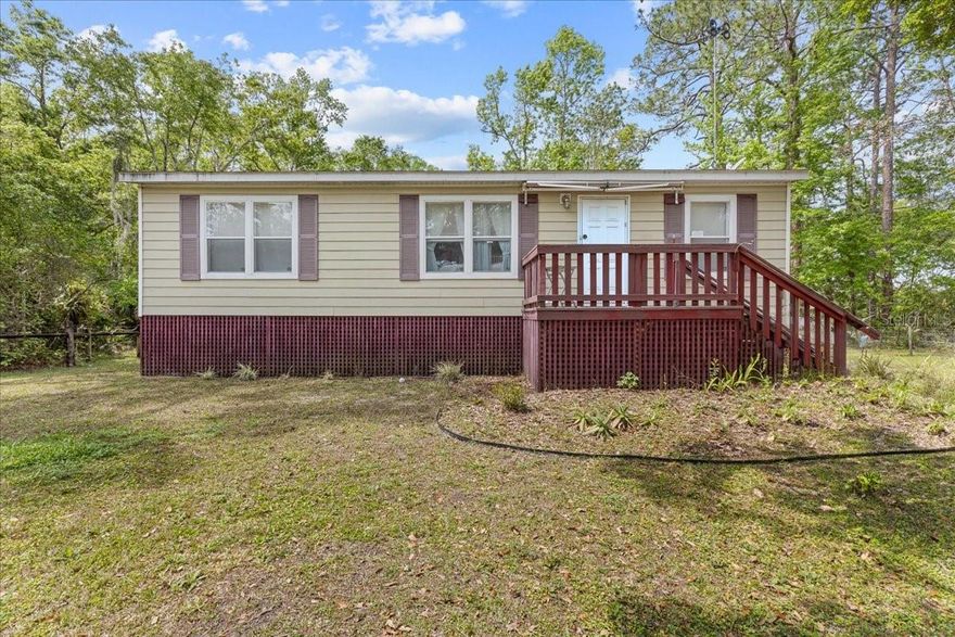 ONE BLOCK from the Suwanne River, FULLY Furnished! Excellent price on this FULLY Furnished 3 bedroom/2 bathroom (one bedroom without closet currently used as an office) located in the community of Fowlers Bluff. This home is only a block away from the local Treasure Camp Restaurant and one block away from the Fowlers Bluff public boat ramp for some of the best freshwater fishing in the great Suwannee River. A short ride to our very own little island town of Cedar Key and the Gulf of America. This home is in immaculate condition, barely lived in .You will enter a gorgeous bright open floor plan with a spacious living room, dining room and open kitchen with tons of cabinetry. You have 2 bedrooms/2 bathrooms each ample size along with an additional room that can be used as a bedroom , current use as an office/craftroom. Second bedroom has a Murphy bed. The yard is an outdoor lovers dream. A fully fenced yard loaded with muscadine grape vines, a beautiful front porch. Out back you have a fully screened patio perfect for enjoying Floridas all year warm temps, a back deck perfect for entertaining and grilling. A 2 car detached carport with workshop attached. This property is the perfect forever home, seasonal home OR would make an amazing short term rental like air BNB or Vrbo. Call today for YOUR tour this gem wont last long!