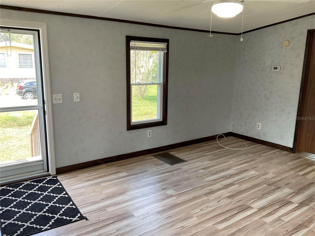 Photo of 18057 SE 20th Place, Silver Springs, FL 34488 (MLS # OM712059)