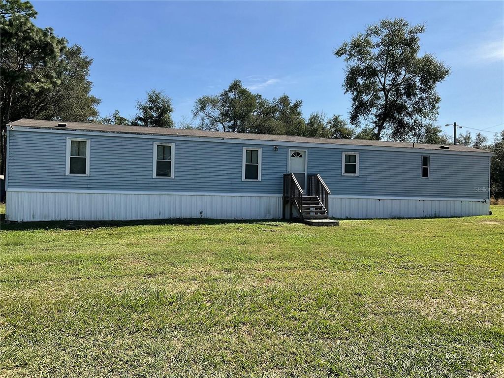 Photo of 18057 SE 20th Place, Silver Springs, FL 34488 (MLS # OM712059)