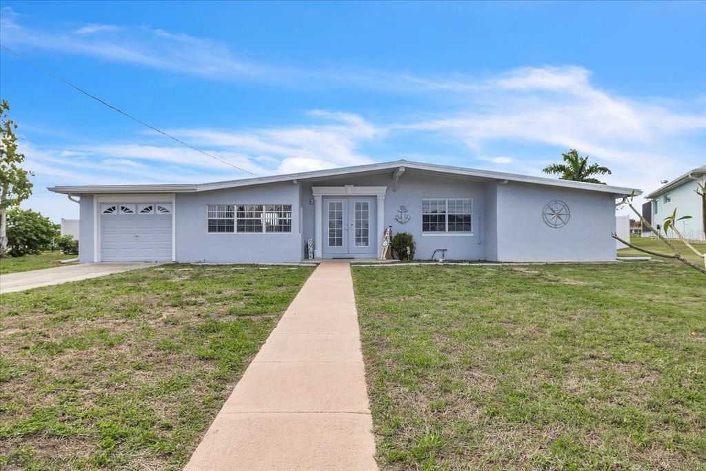 Photo of 137 Poinsettia Circle NE, Port Charlotte, FL 33952 (MLS # C7523601)